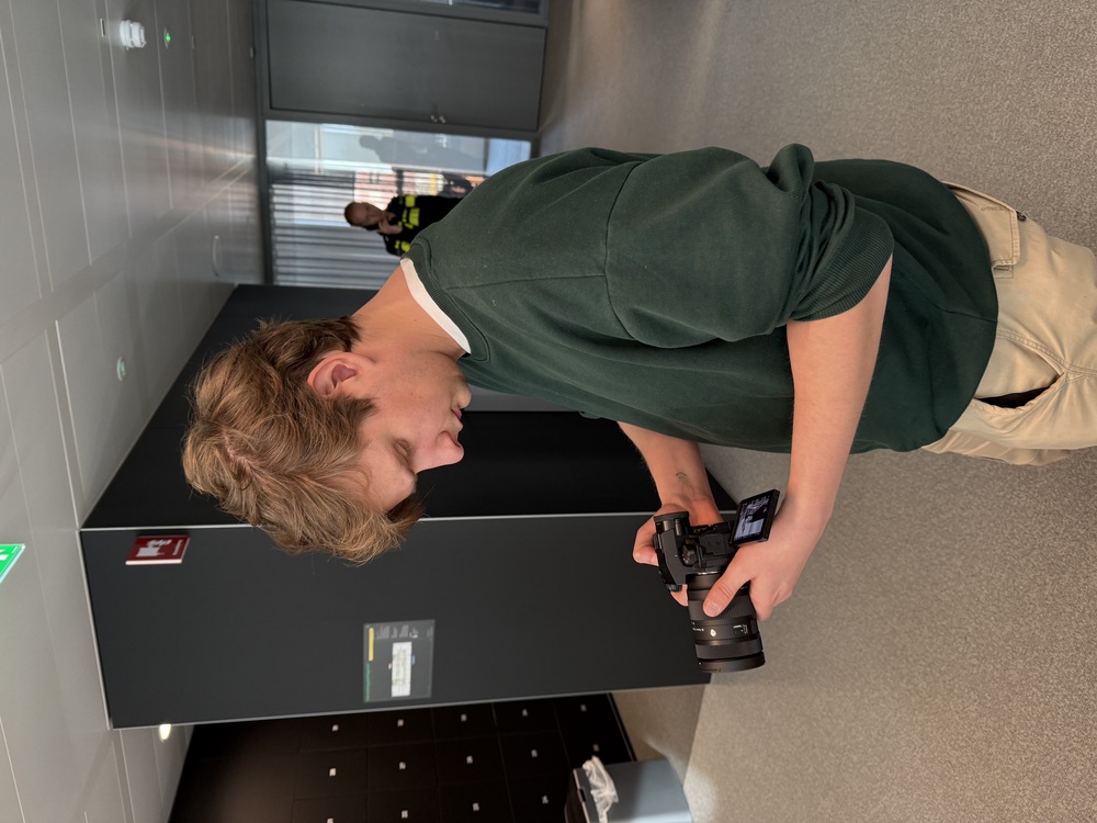 Lars holding camera